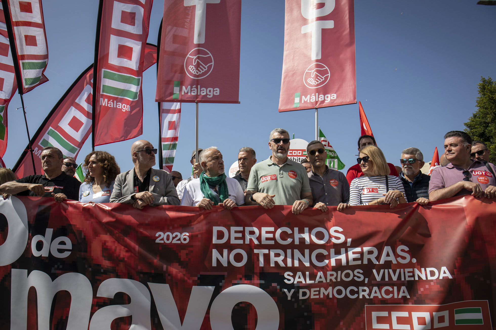 5. Cabecera de la manifestación del Primero de Mayo con dirigentes de UGT y CCOO, en la ciudad de Málaga